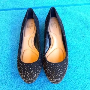 Like new. Black with gold specs and heels